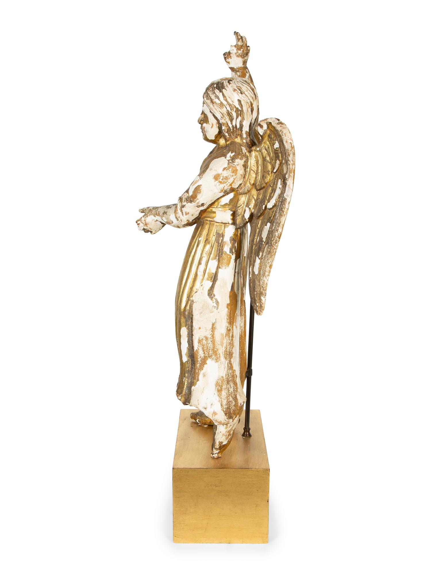A Continental Giltwood Figure of an Angel