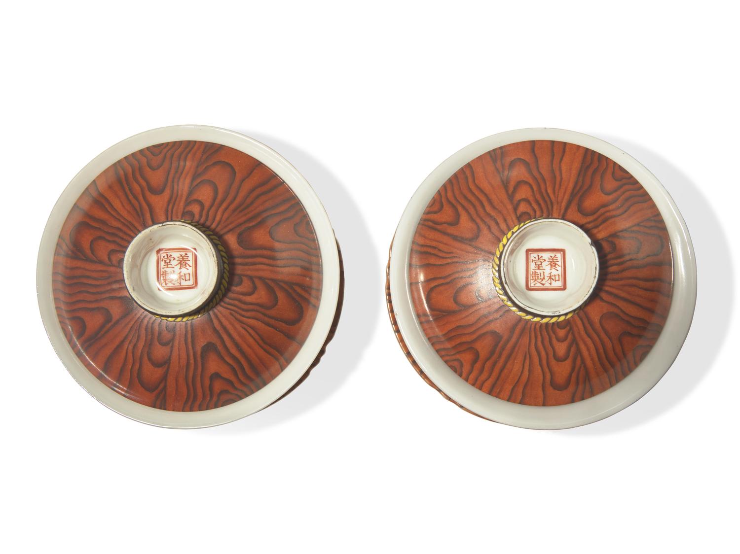 A Pair of Chinese Faux Bois Porcelain Erotic Tea Bowls, Covers, and Stands