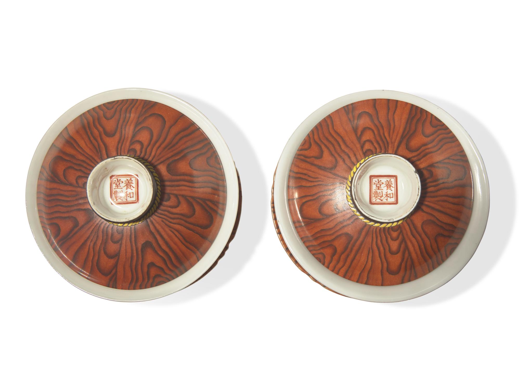 A Pair of Chinese Faux Bois Porcelain Erotic Tea Bowls, Covers, and Stands