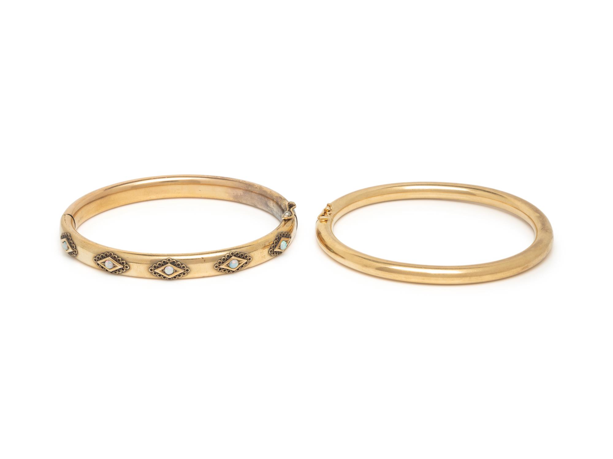 COLLECTION OF YELLOW GOLD BANGLE BRACELETS