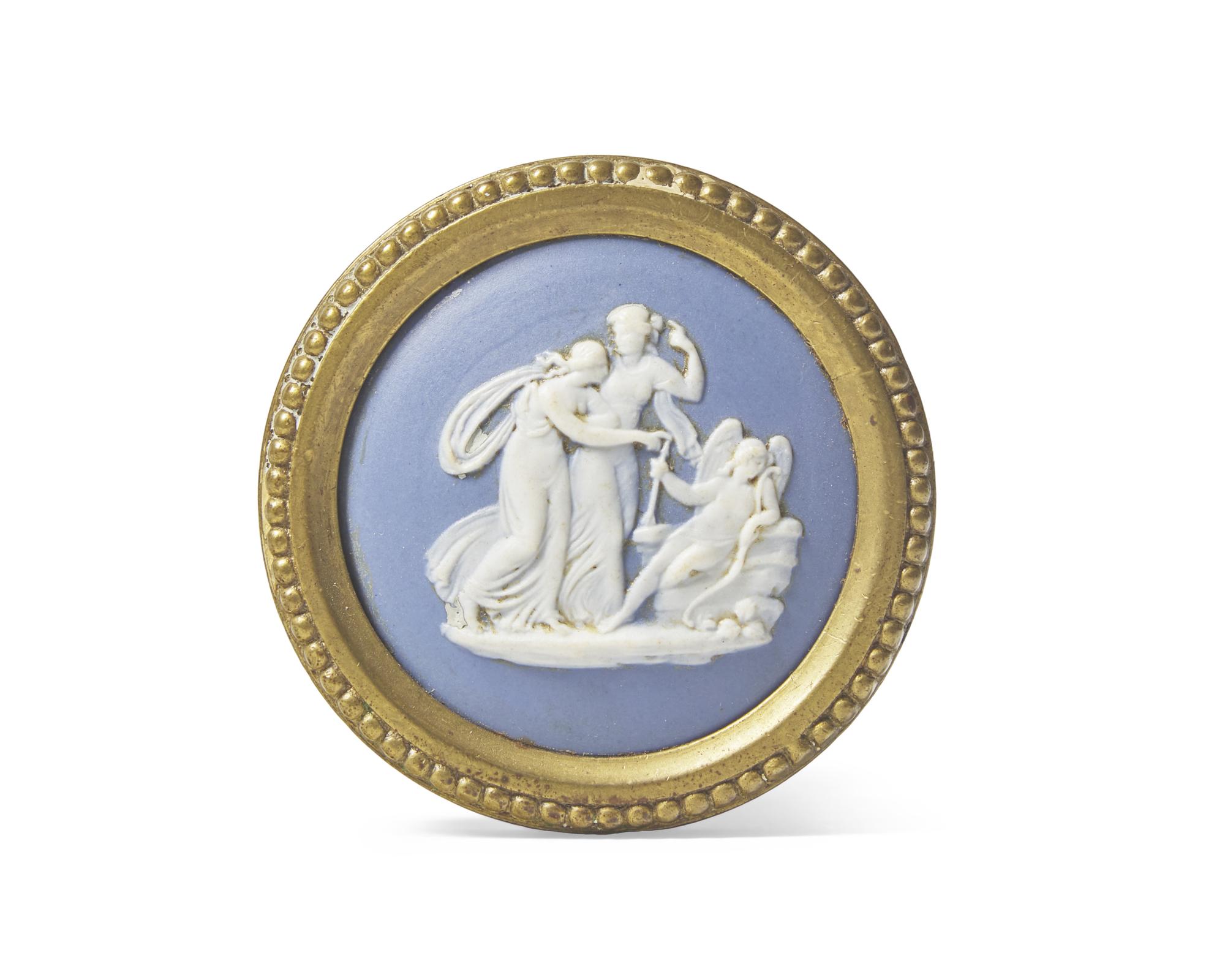 A Brass Doorknob with Inset Wedgwood Jasperware Medallion