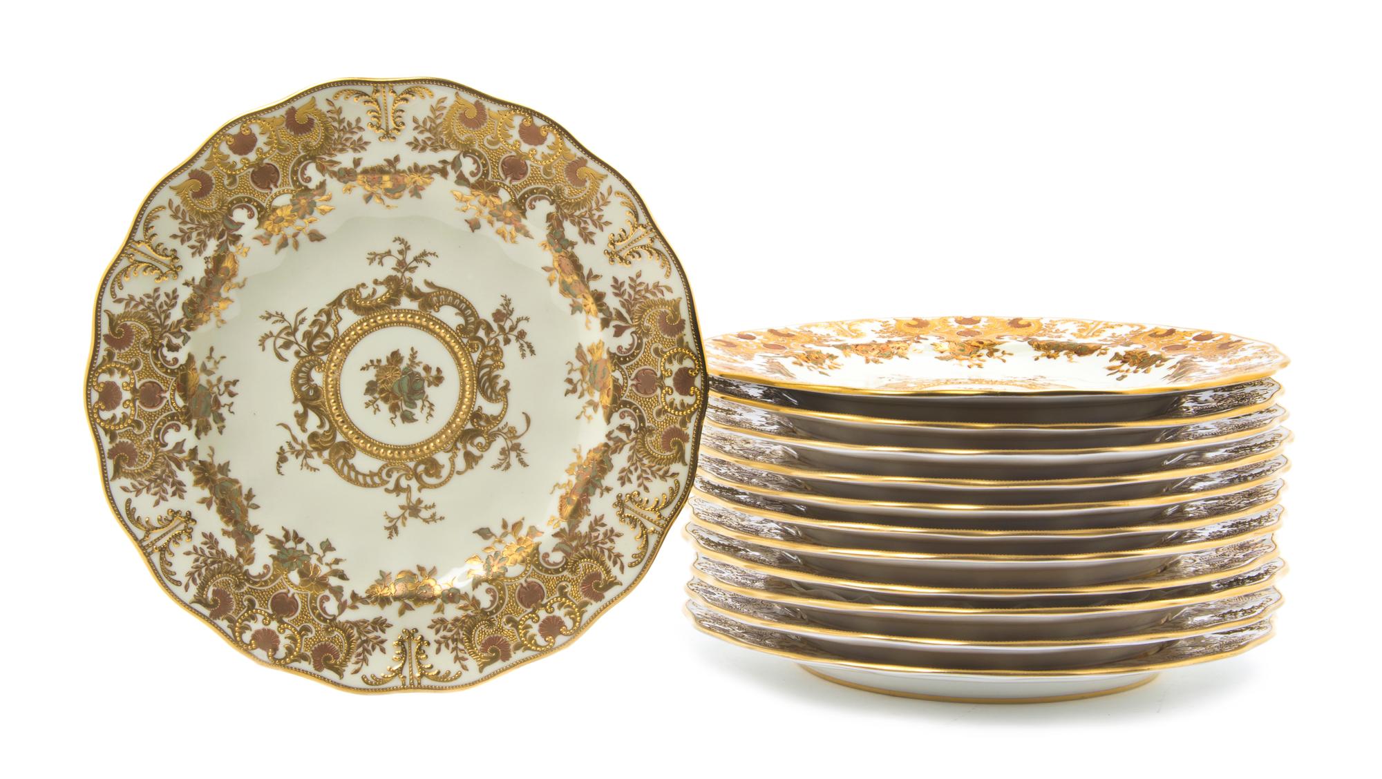 Twelve Royal Crown Derby Porcelain Dinner Plates, Diameter 8 7/8 inches.