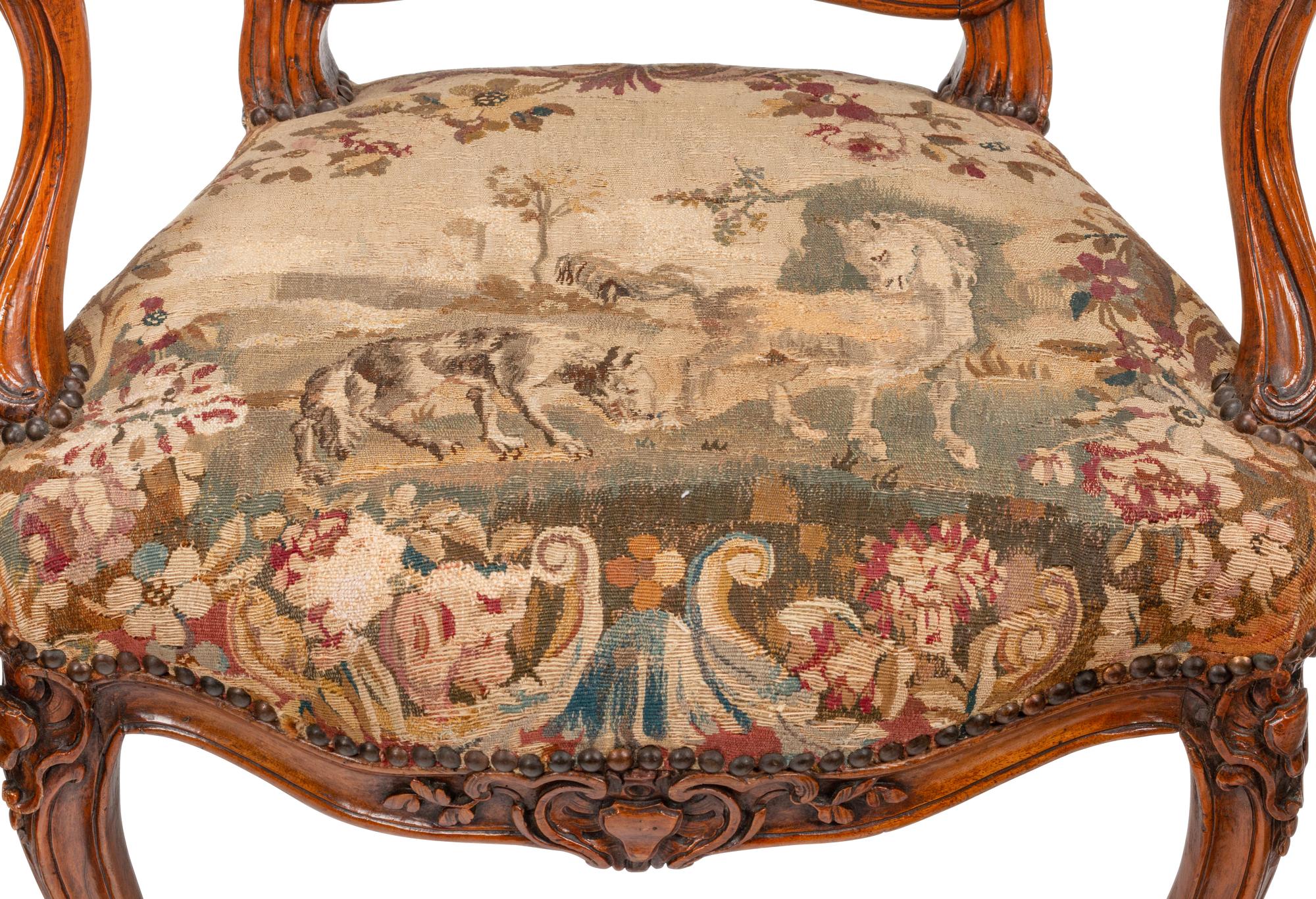 A Set of Four Louis XV Beechwood Fauteuils