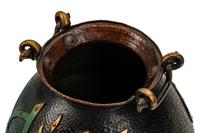 A Middle Eastern Hand-Hammered Vessel with Arabic Calligraphy