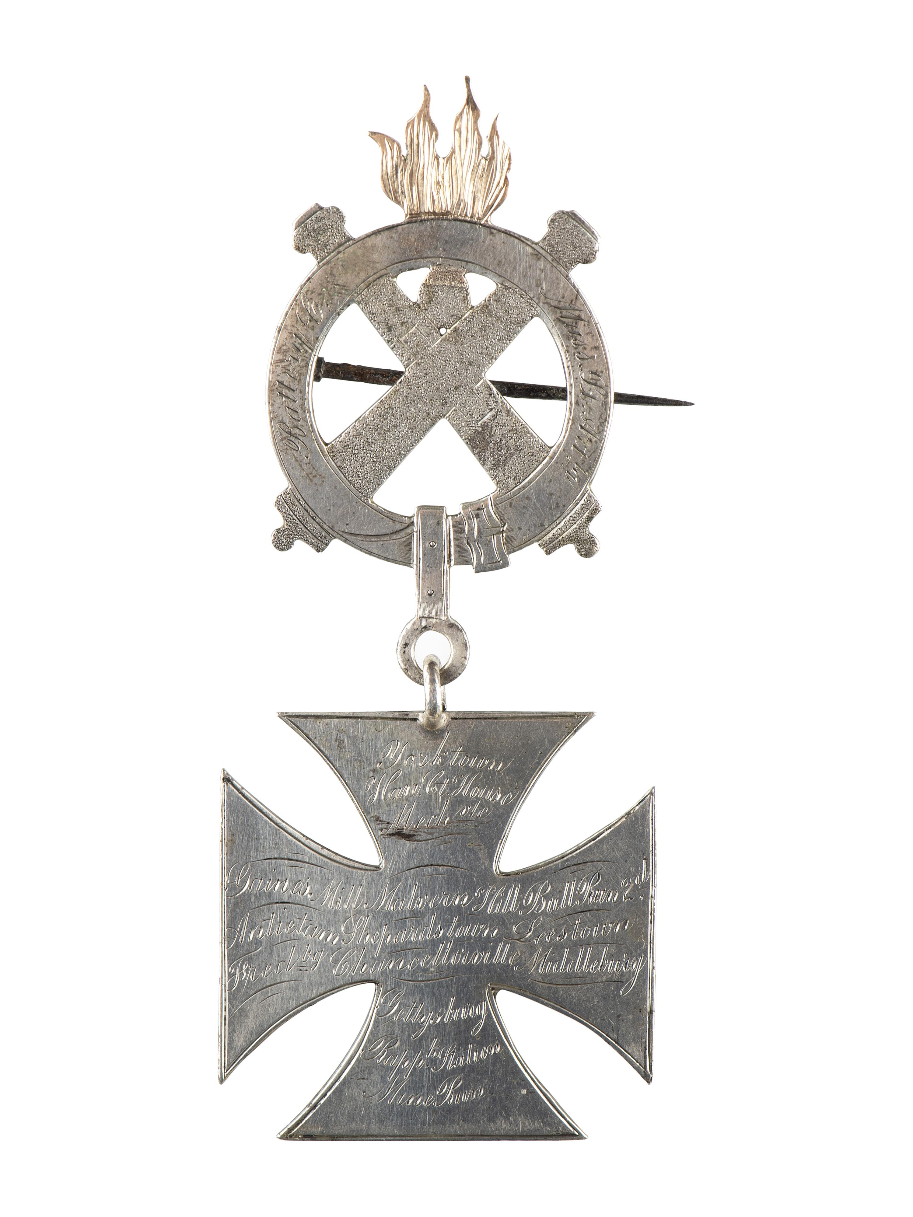 [CIVIL WAR]. Badge identified to Alfred J. Johnson, 1st, 3rd, and 5th Massachusetts Light Artilleries.