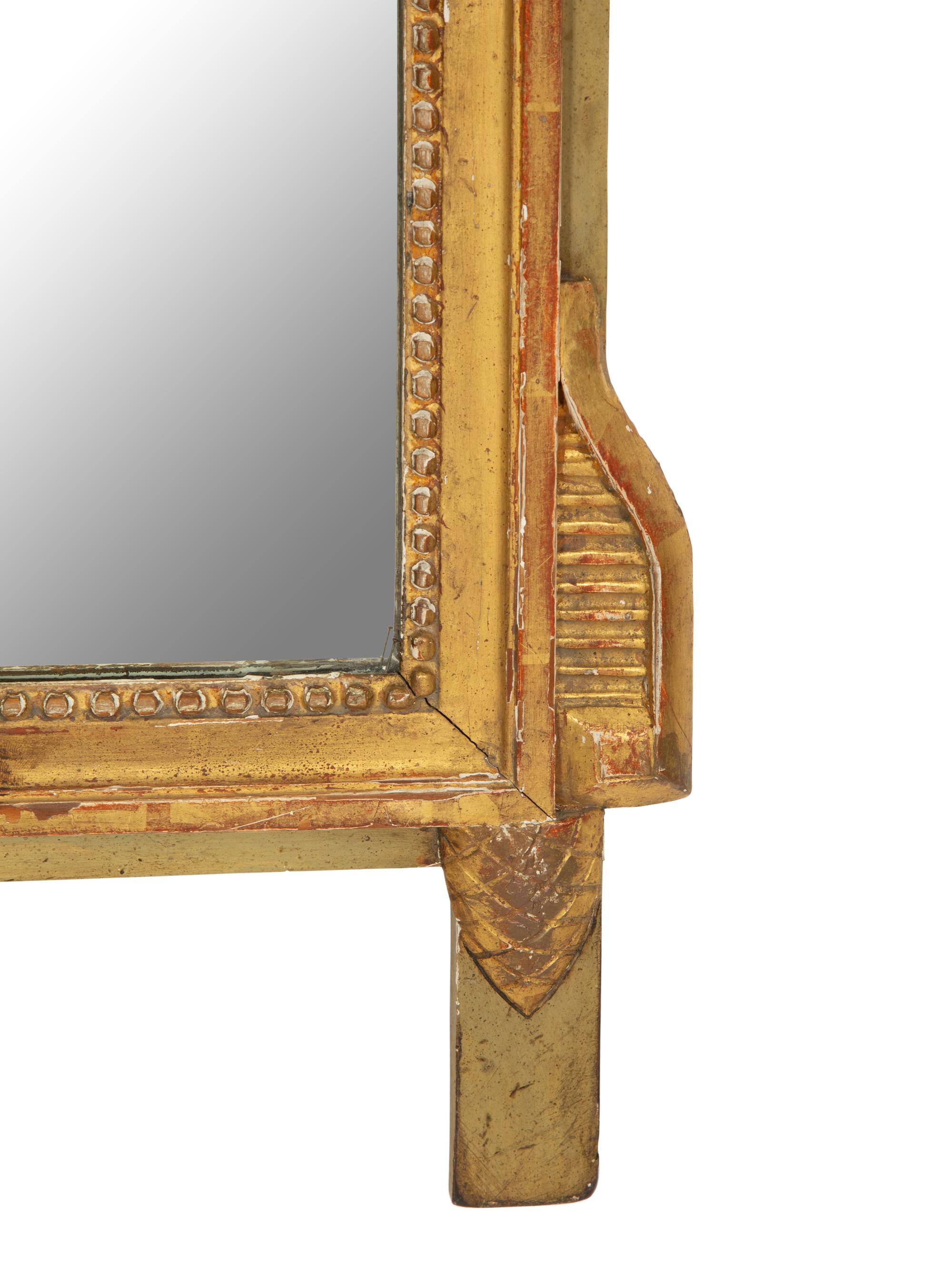 A Pair of Italian Carved Giltwood Mirrors