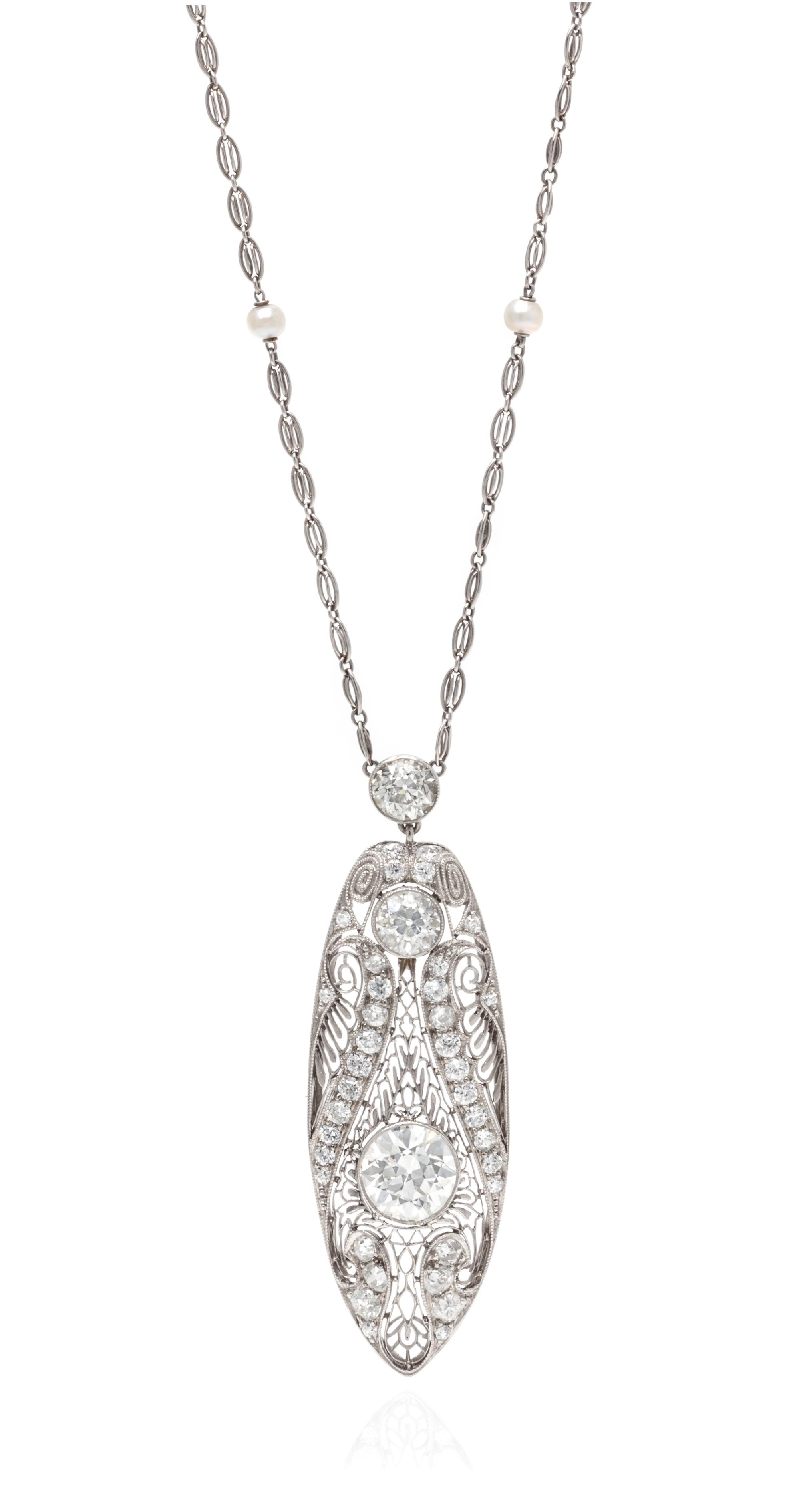 A Fine Edwardian Platinum, Diamond and Seed Pearl Necklace, 7.60 dwts.