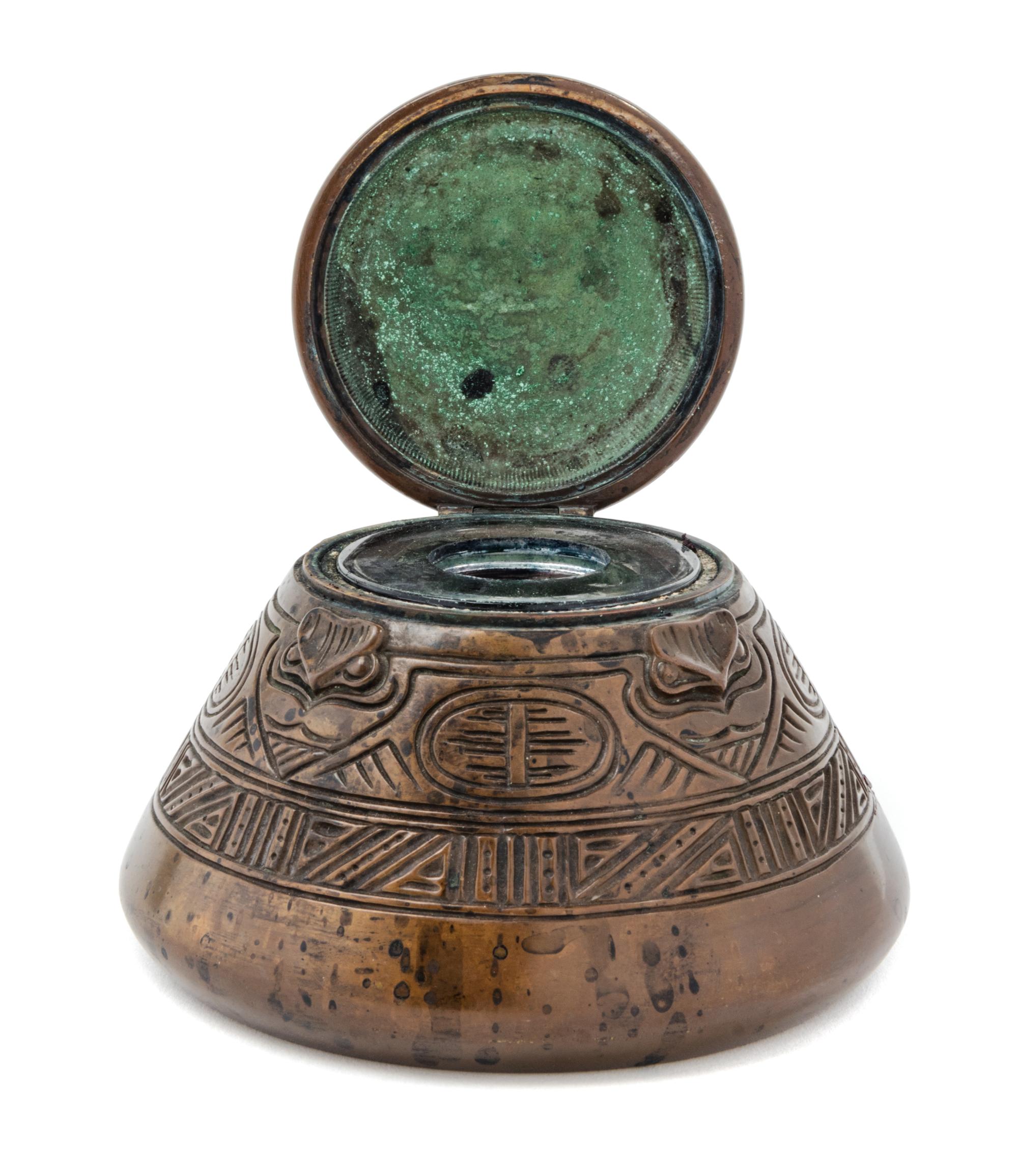Tiffany Studios, EARLY 20TH CENTURY, an American Indian pattern bronze inkwell, (1183)