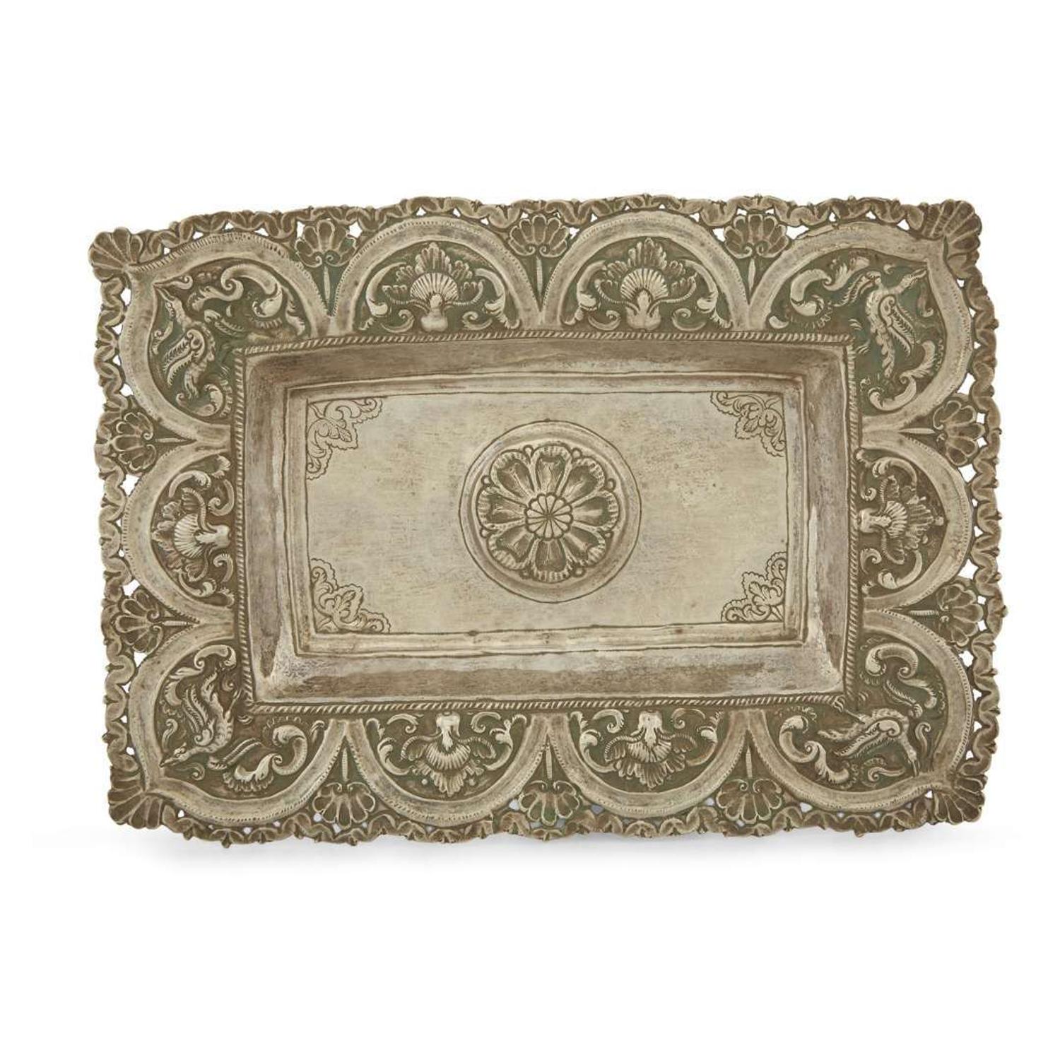 Three Spanish Colonial silver repoussé rectangular sideboard dishes Possibly Potosi, Bolivia, early 18th century