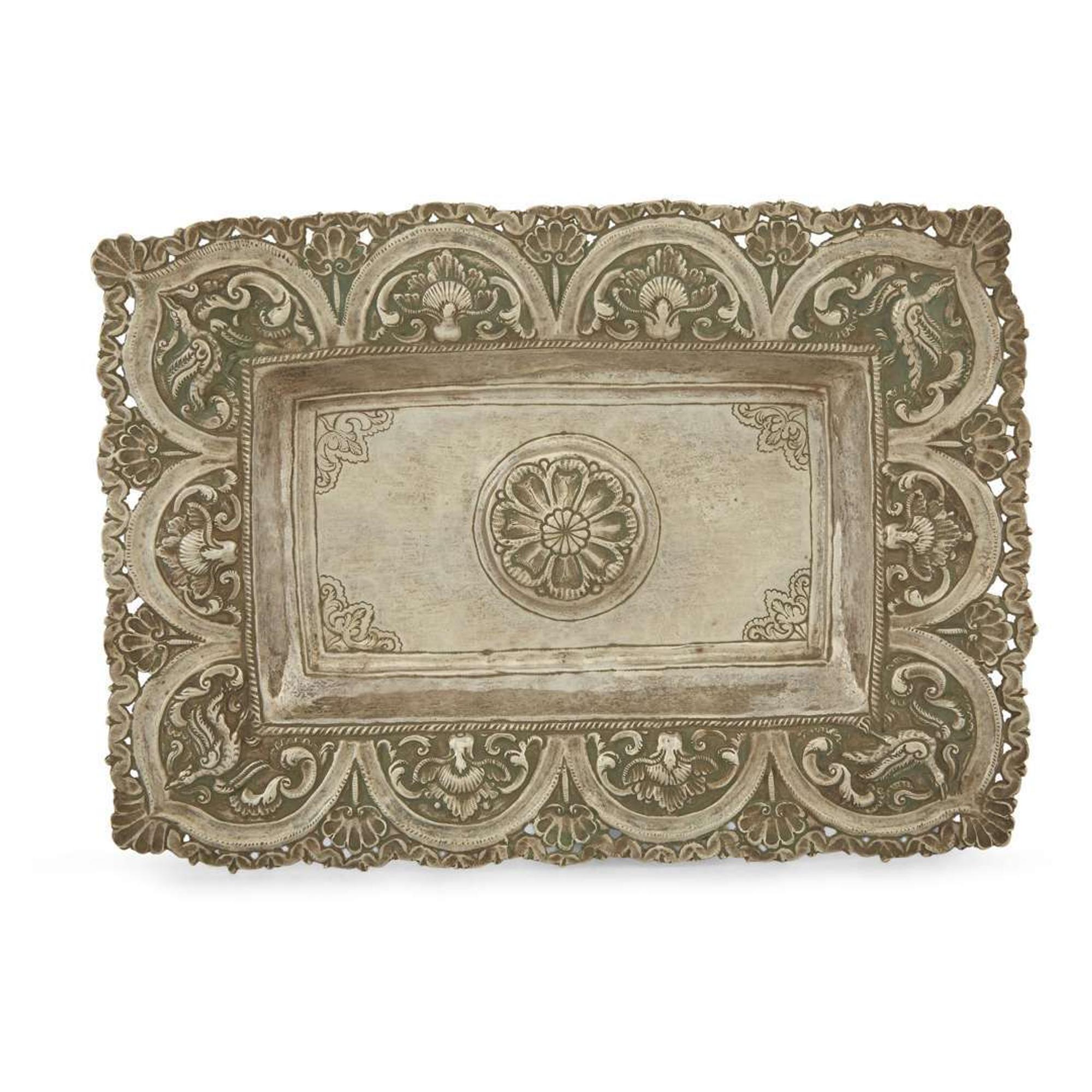 Three Spanish Colonial silver repoussé rectangular sideboard dishes Possibly Potosi, Bolivia, early 18th century