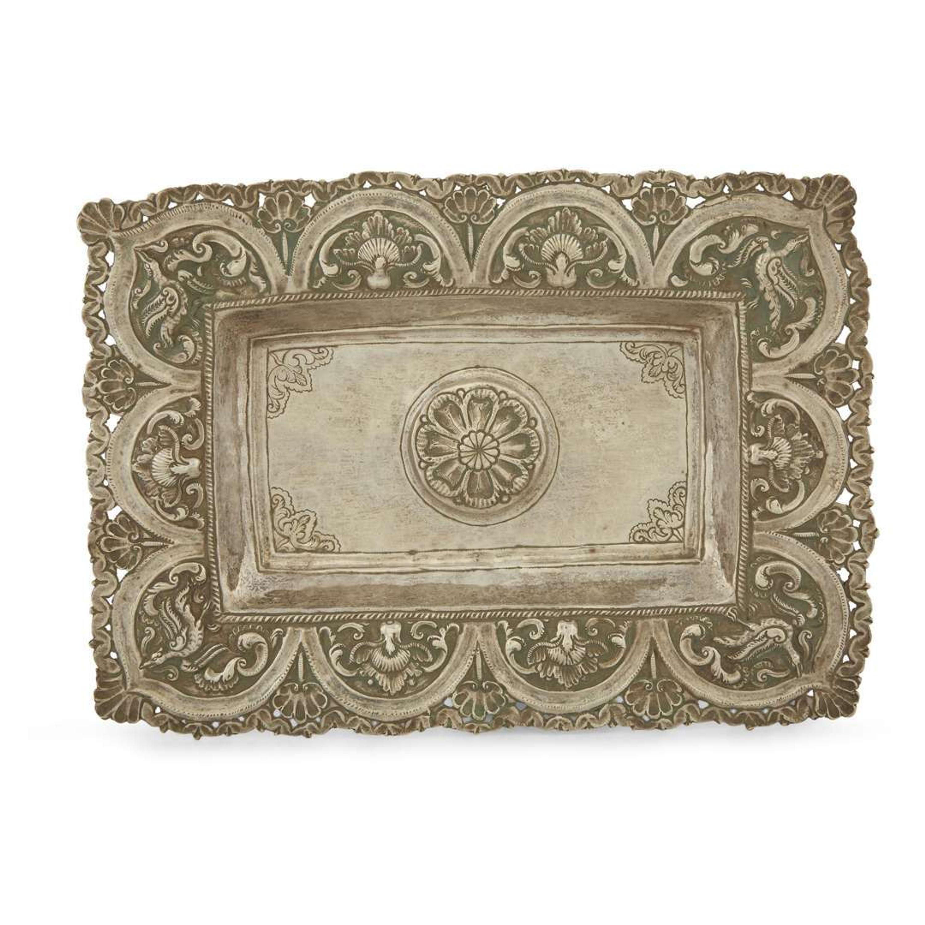 Three Spanish Colonial silver repoussé rectangular sideboard dishes Possibly Potosi, Bolivia, early 18th century
