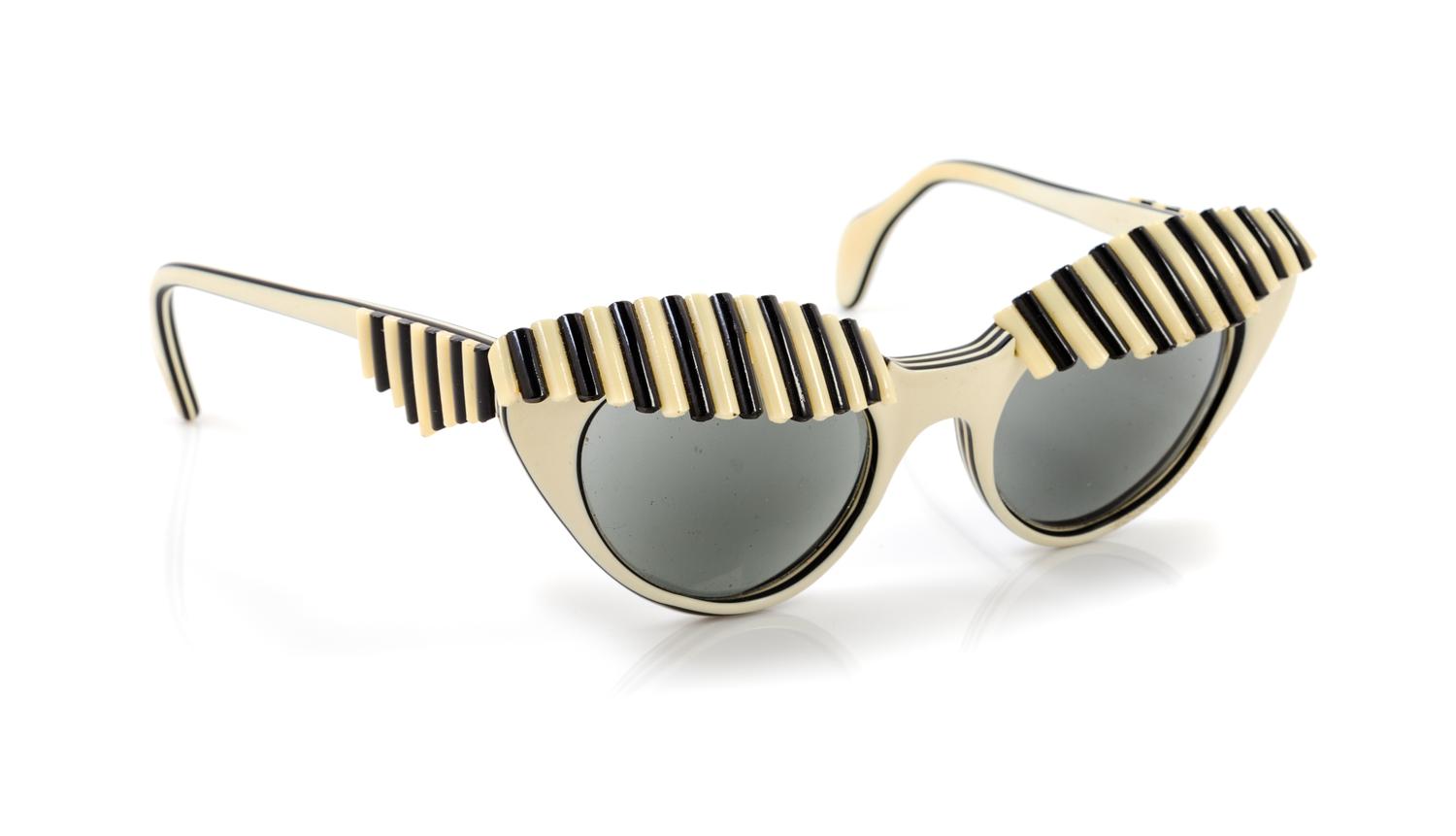 A Pair of Schiaparelli Cabana Awning Sunglasses,