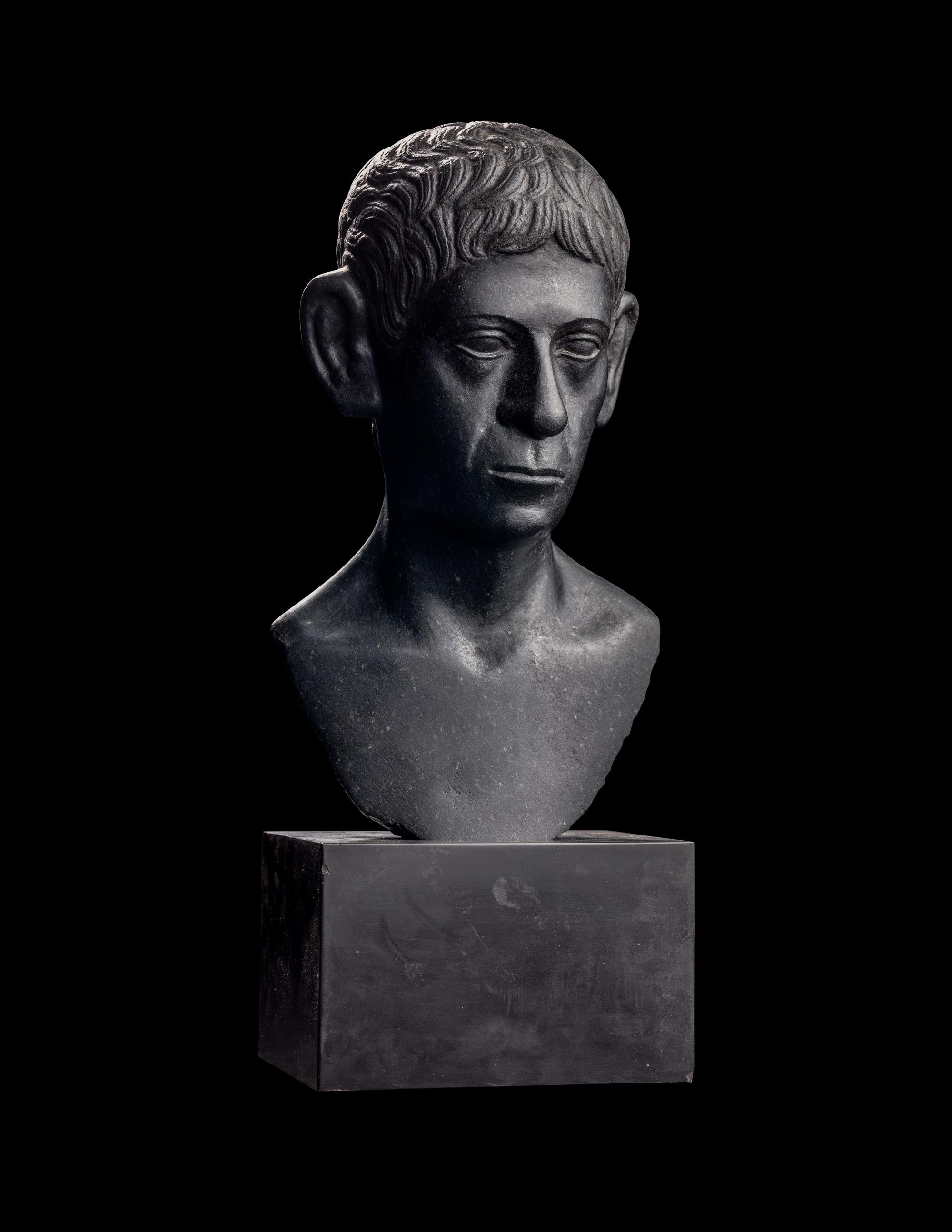 A Romano-Egyptian Black Basalt Male Portrait Bust