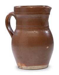 A P.H. Smith Albany Slip Stoneware Pitcher