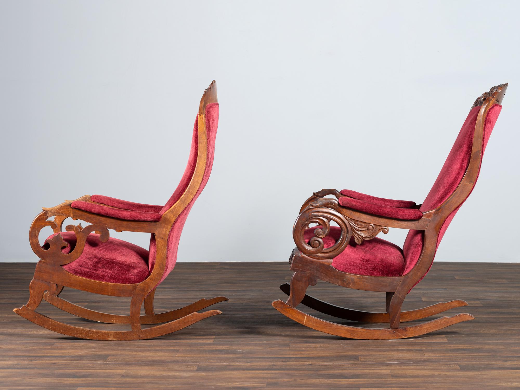 A Matched Pair of Victorian Carved Walnut Rocker Armchairs