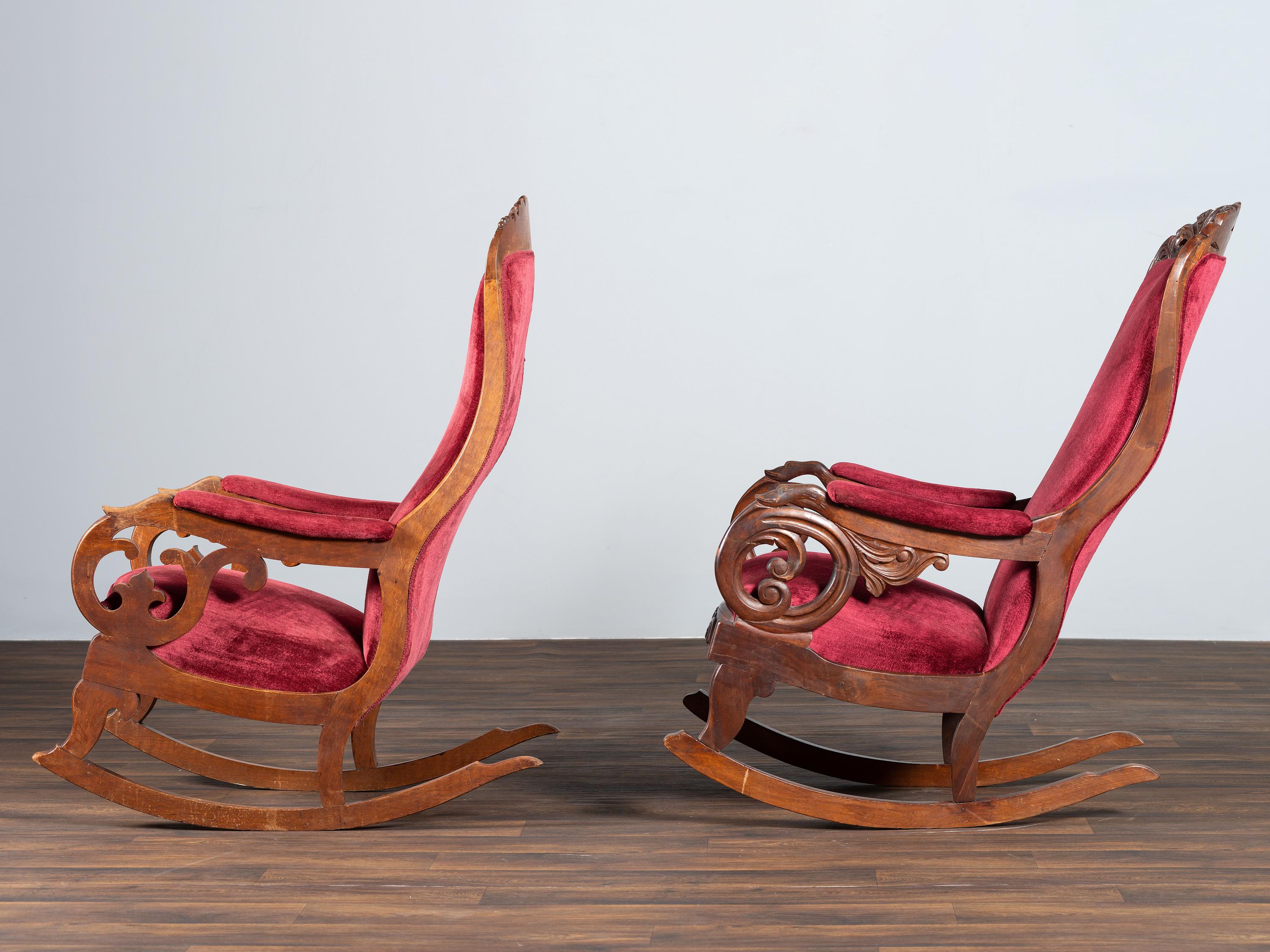A Matched Pair of Victorian Carved Walnut Rocker Armchairs
