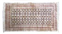 A Bokhara Wool Rug 7 feet x 4 feet 3 inches.