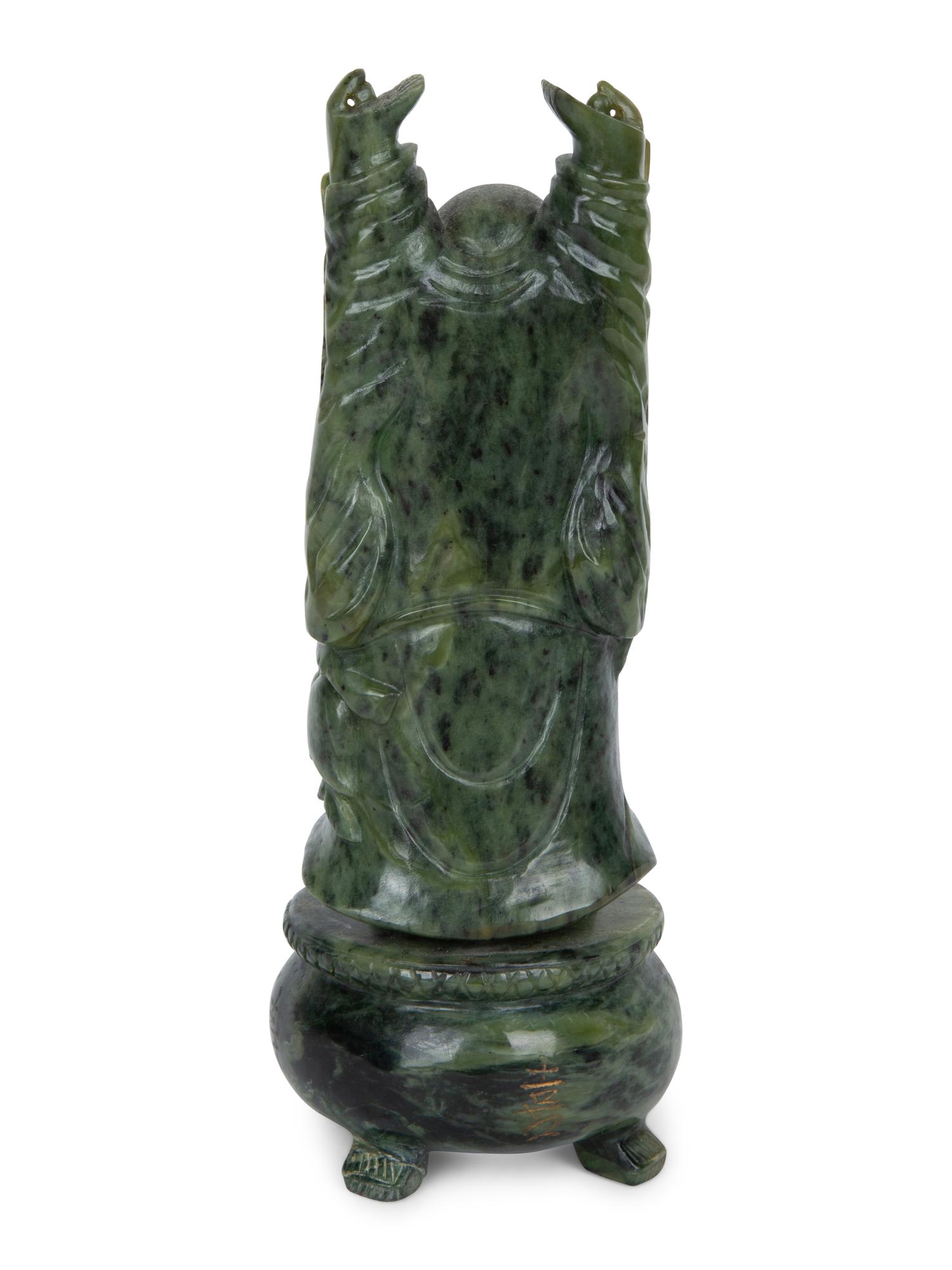 A Chinese Carved Spinach Jade Laughing Buddha — 20TH CENTURY