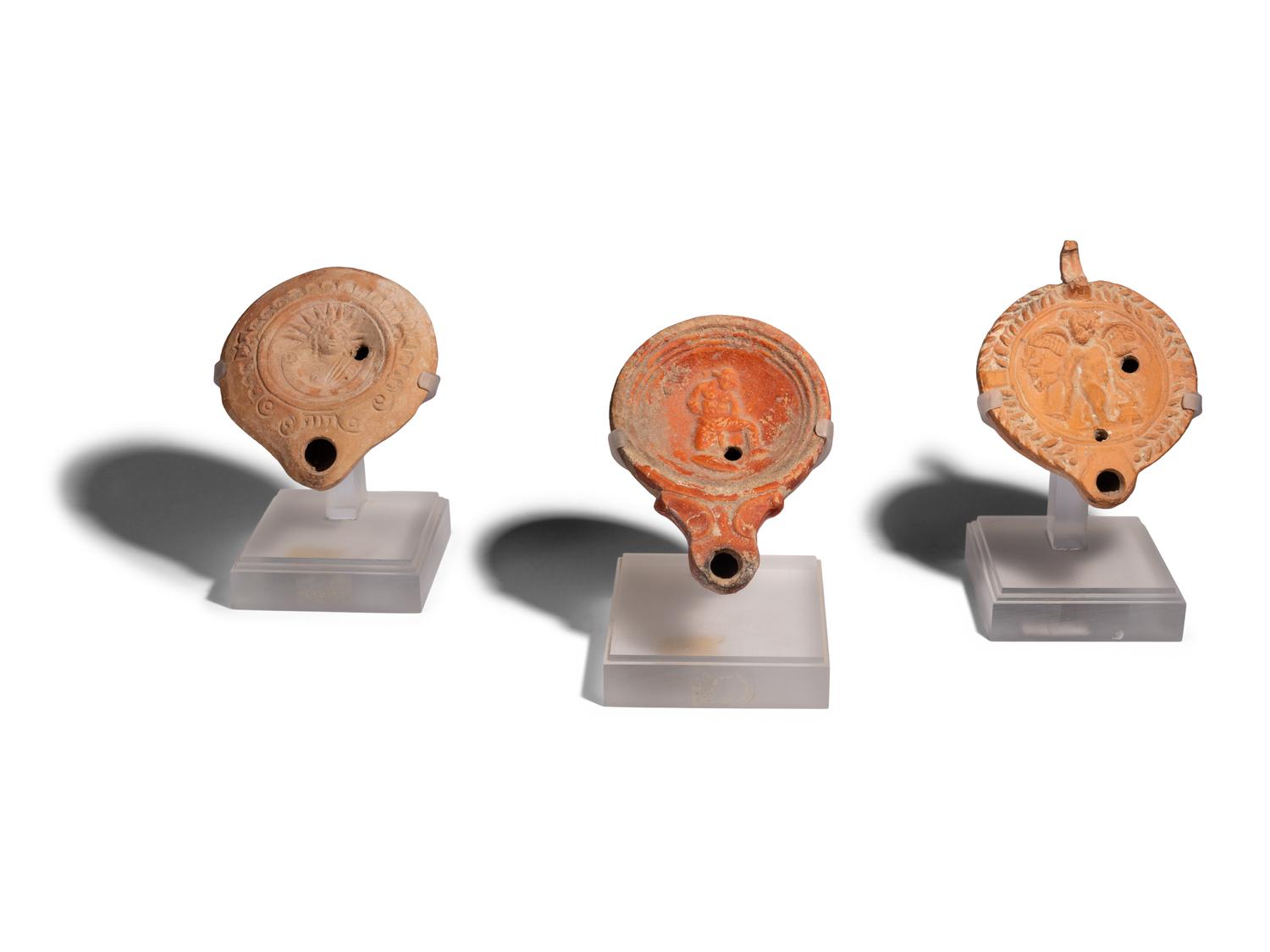 Three Roman Terracotta Oil Lamps