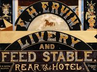 A Reverse Painted and Foil Decorated E. H. Ervin Livery and Feedstable Shop Sign