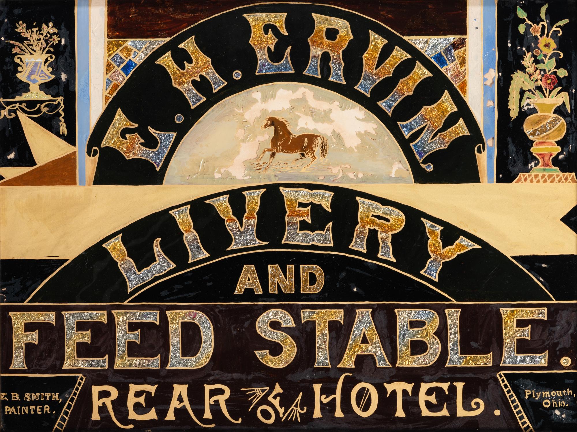 A Reverse Painted and Foil Decorated E. H. Ervin Livery and Feedstable Shop Sign