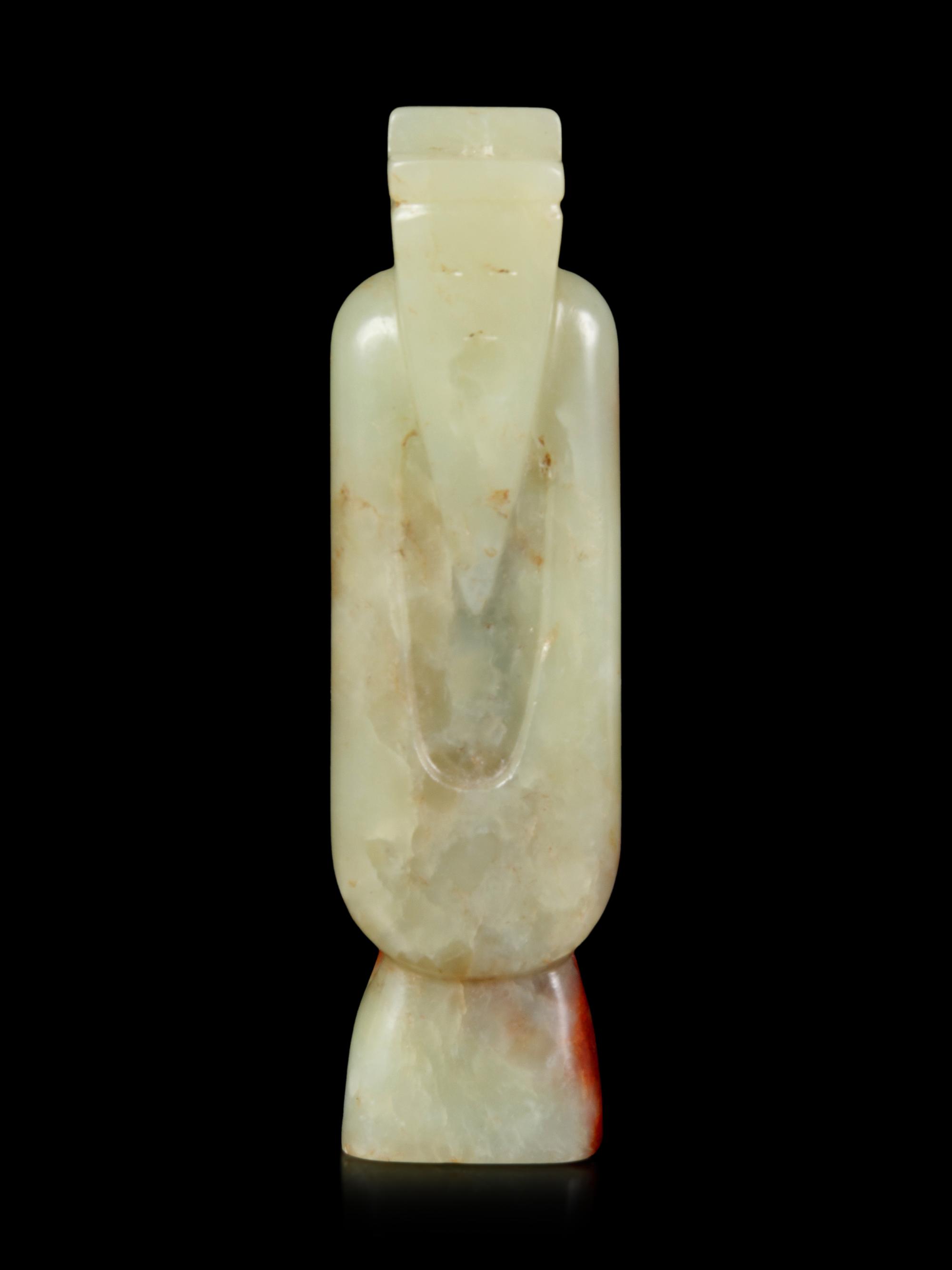 A Yellow and Russet Jade Figure of a Man