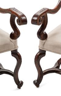 A Pair of Régence Carved Walnut Fauteuils