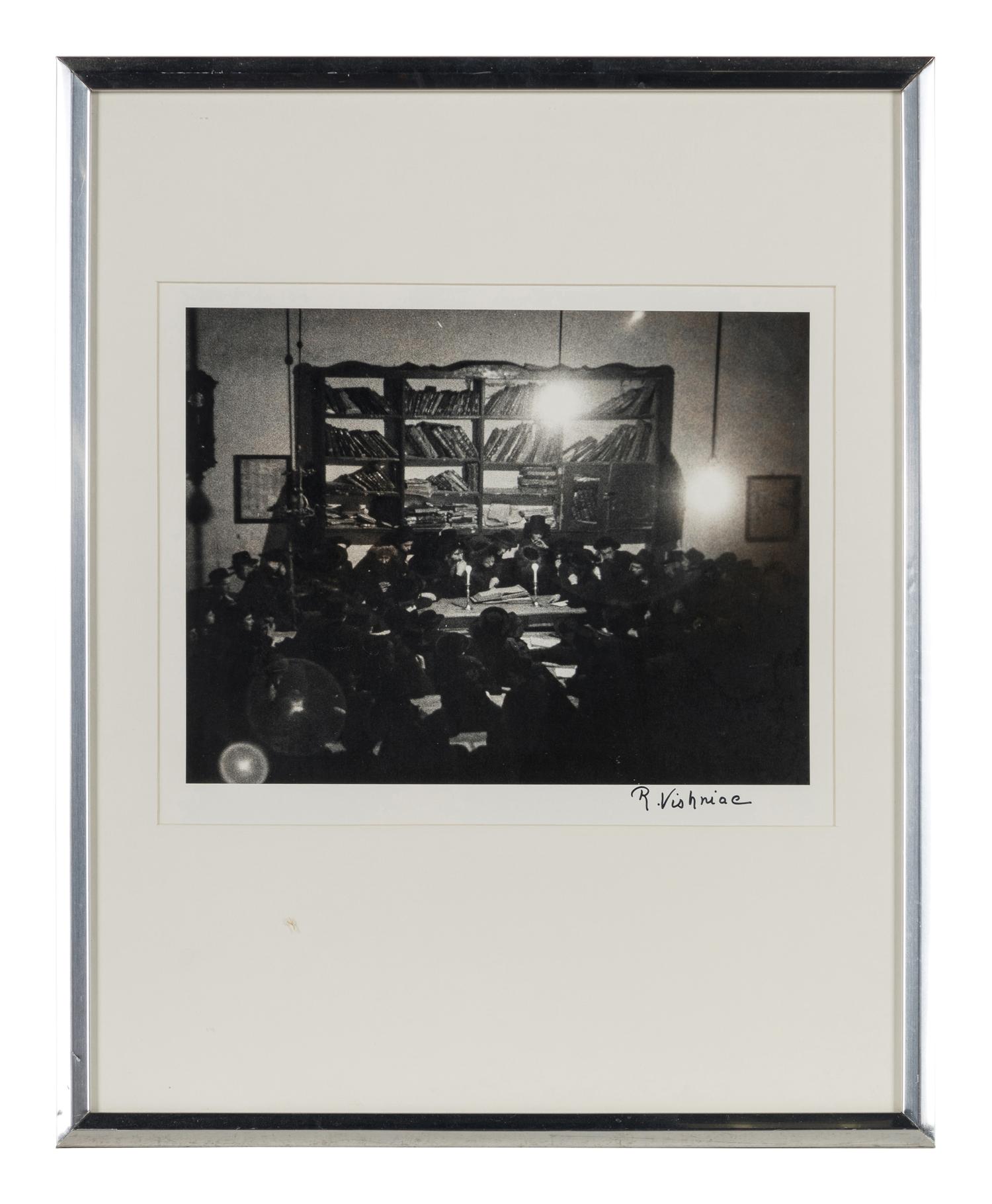 Roman Vishniac (1897-1990) Munkatch, Baruch Rabinovitch examining the Yeshiva, 1938