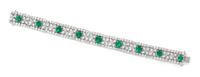 An 18 Karat Bicolor Gold, Emerald and Diamond Bracelet, 26.25 dwts.