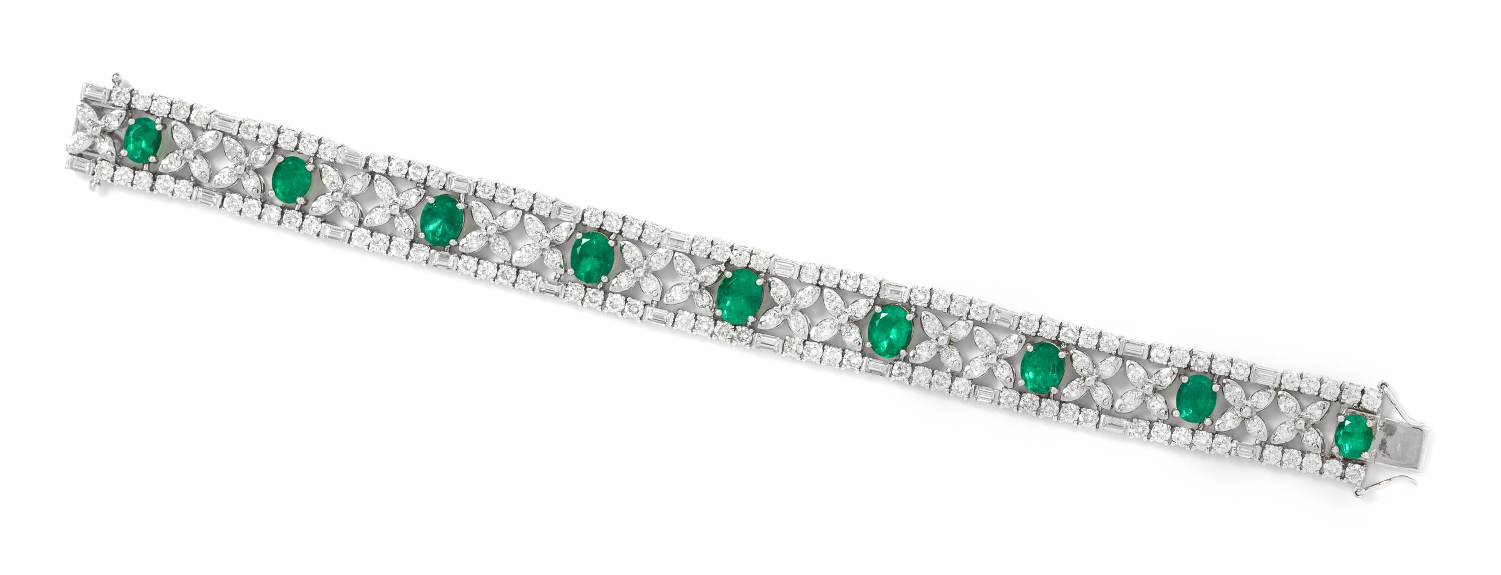 An 18 Karat Bicolor Gold, Emerald and Diamond Bracelet, 26.25 dwts.