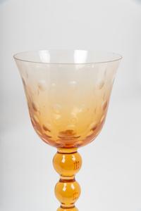 A Set of Fifteen St. Louis Amber Glass Stems