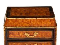 A Diminutive Gilt Bronze Mounted Parquetry Chest of Drawers