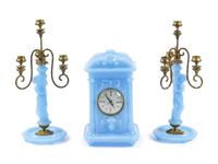 A Continental Blue Opaline Glass Three-Piece Clock Garniture
