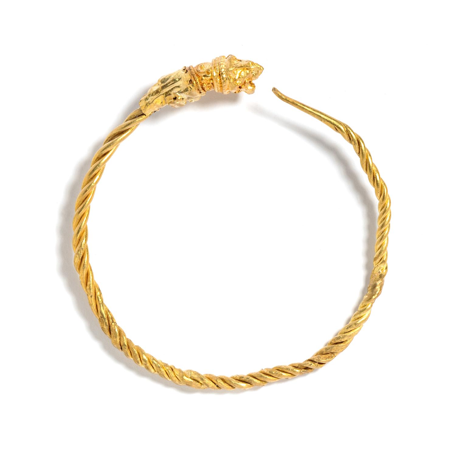 A Large Hellenistic Gold Hoop Earring with a Lion-Head Terminal