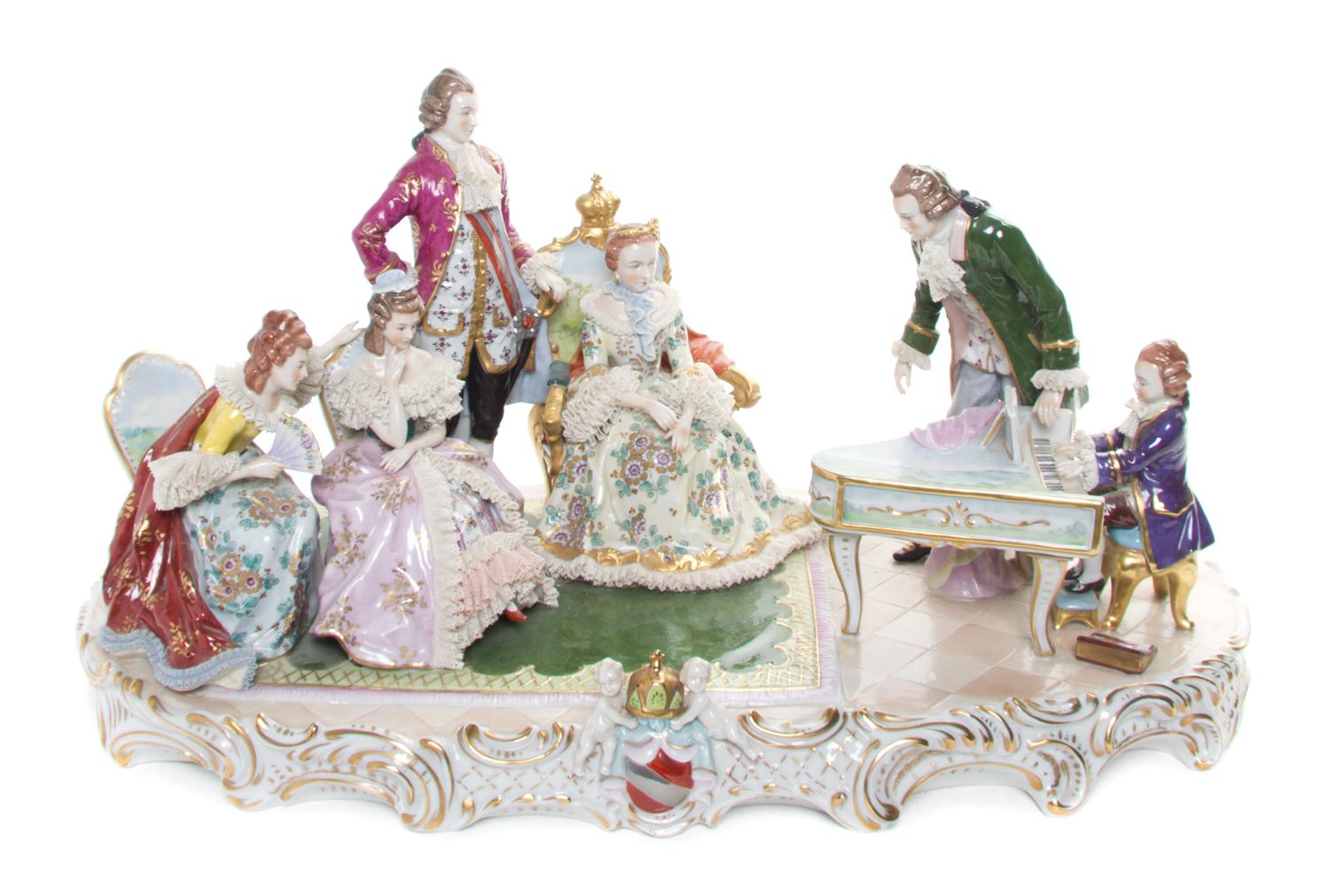 A Sitzendorf Porcelain Figural Group Height 11 1/2 x width 22 inches.