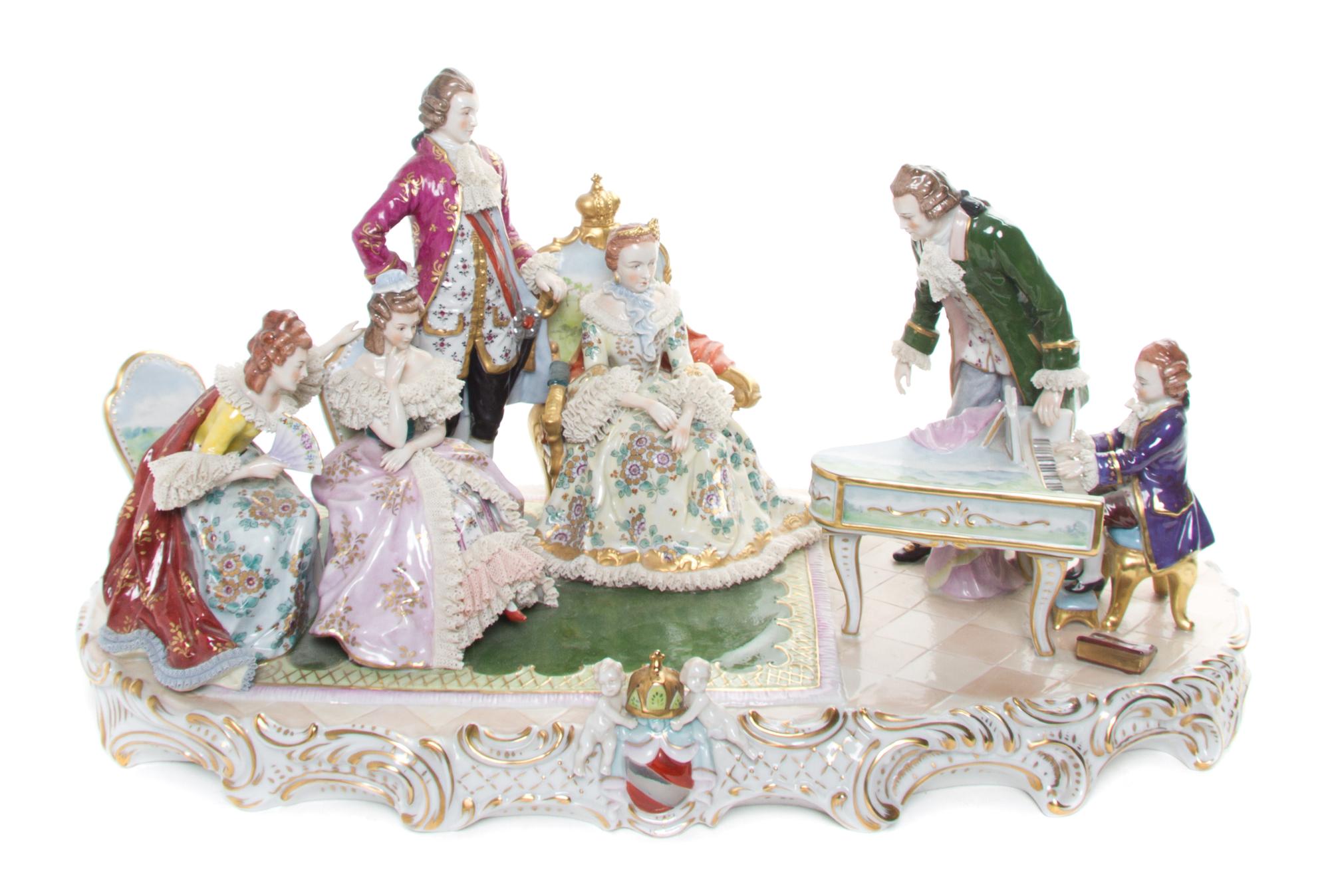 A Sitzendorf Porcelain Figural Group Height 11 1/2 x width 22 inches.
