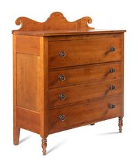 A Late Classical Carved Cherrywood Chest of Drawers