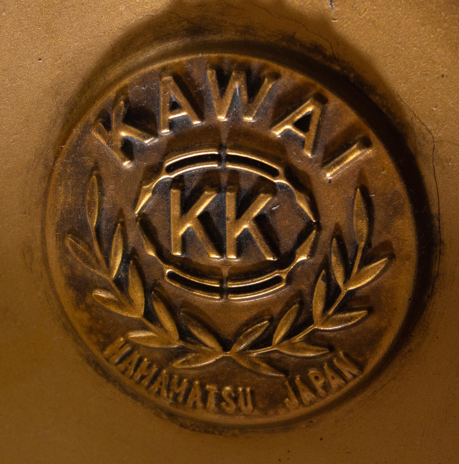 A Kawai Black Lacquered Baby Grand Piano