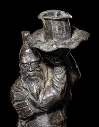 A Japanese Bronze Figural-Form Candle Holder