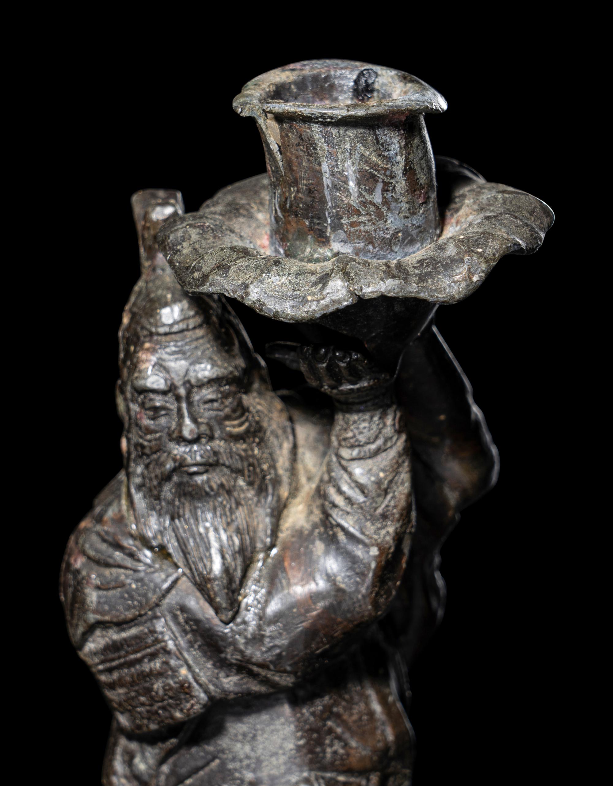 A Japanese Bronze Figural-Form Candle Holder