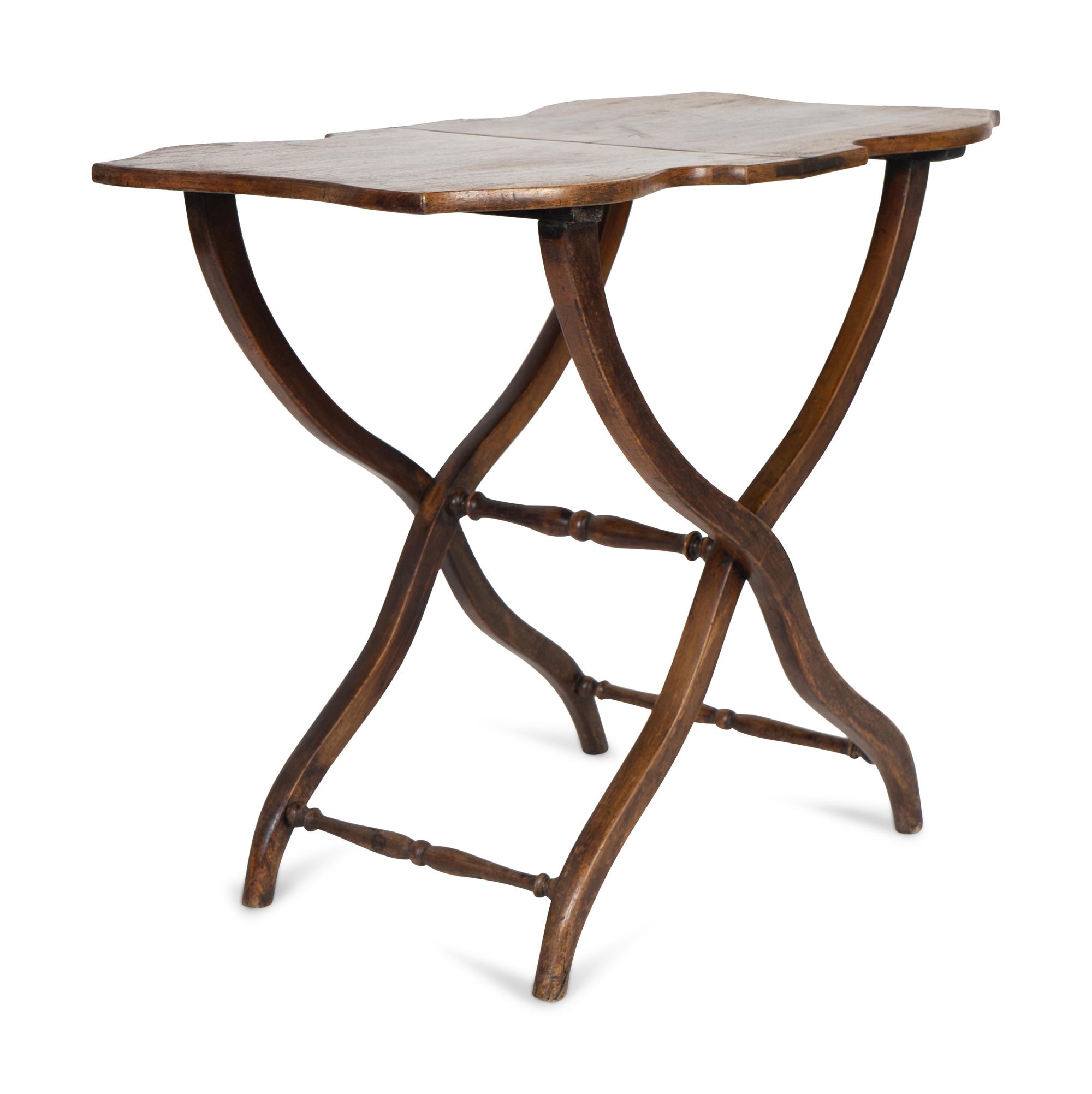 A Victorian Mahogany Folding Butterfly Table on X-form Base — 19TH CENTURY