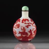 A Chinese Ruby Overlay Glass, Snuff Bottle, Qing Dynasty, 18th/Early 19th Century — 清中期 白地套寶石紅料人物圖鼻煙壺