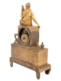 An Empire Style Gilt Bronze Figural Mantel Clock