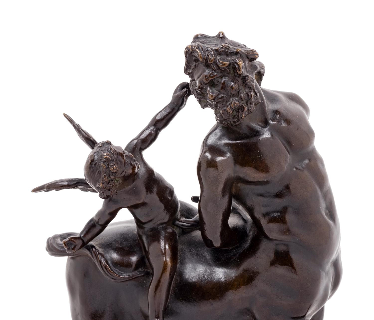 A Grand Tour Bronze Figural Group of a Centaur and Eros