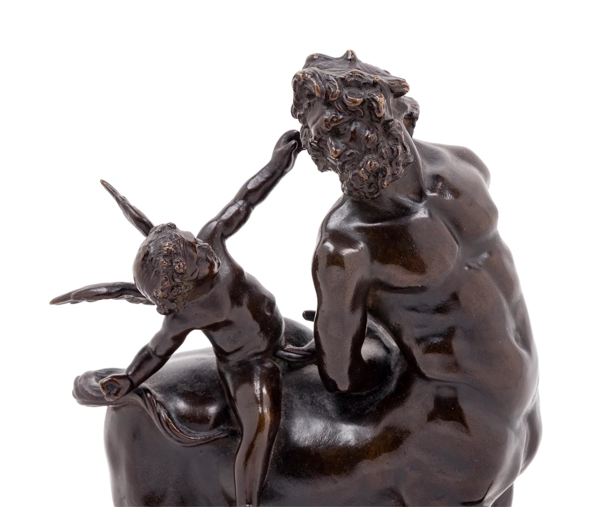 A Grand Tour Bronze Figural Group of a Centaur and Eros