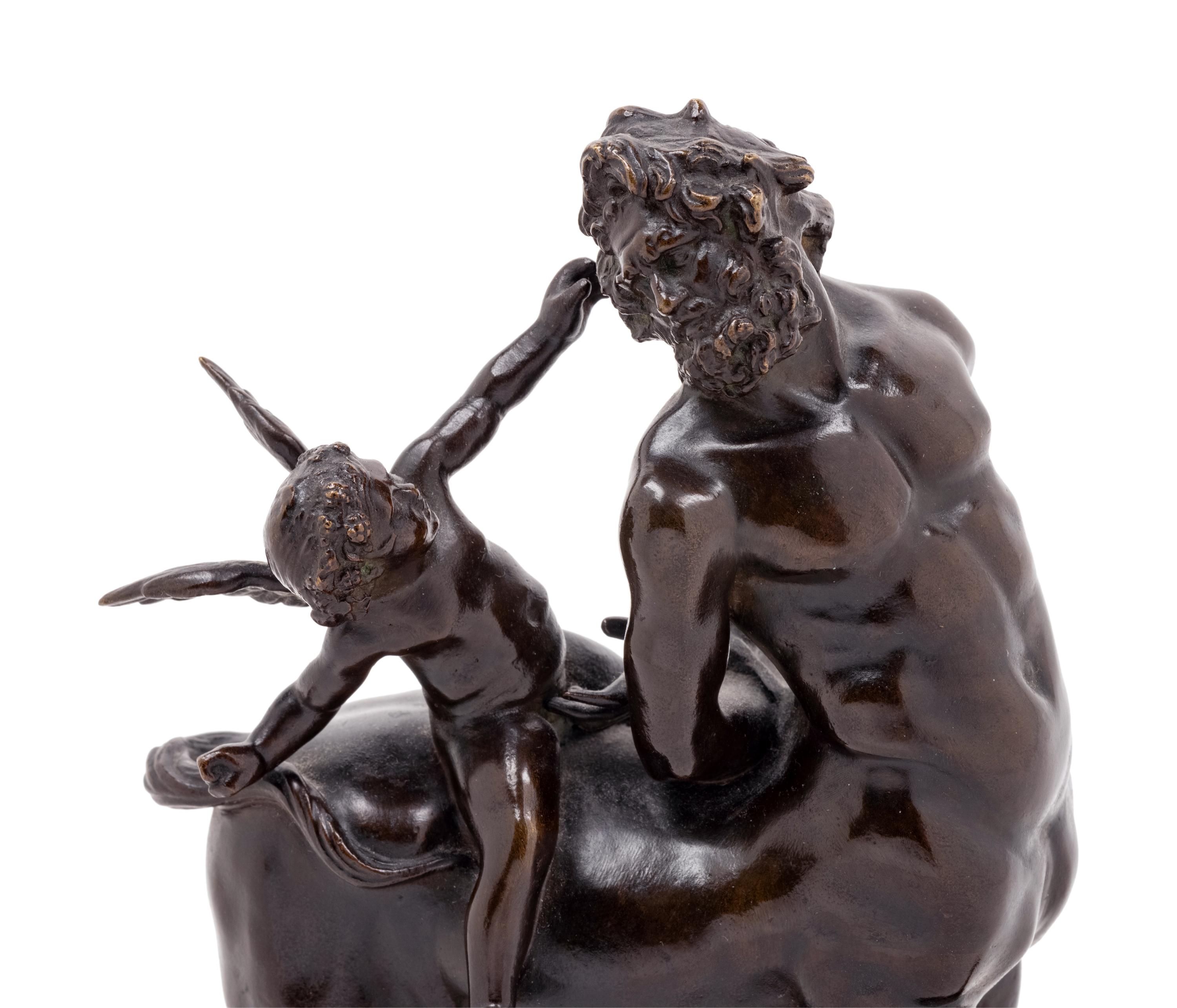 A Grand Tour Bronze Figural Group of a Centaur and Eros