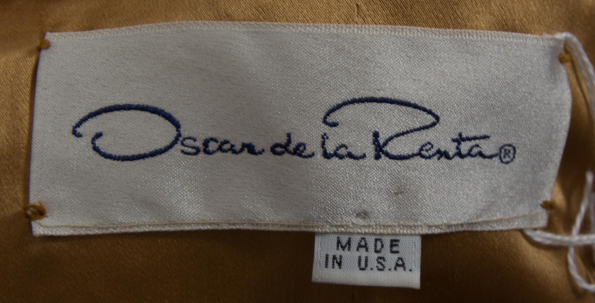 An Oscar de la Renta Gold Beaded Evening Jacket, Size 10.
