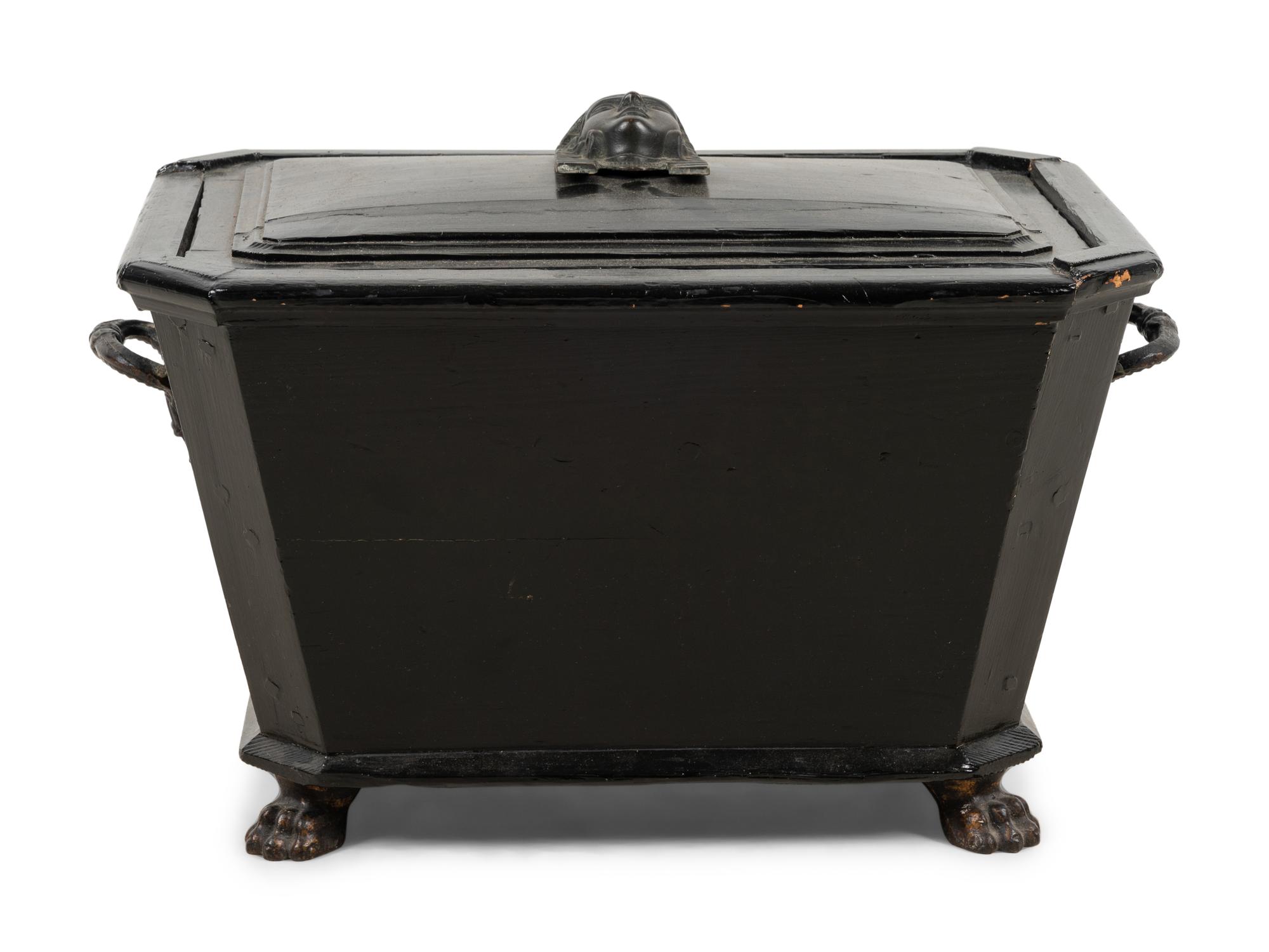 An Egyptian Revival Ebonized Coal Hod