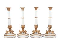 A Set of Four Contemporary Empire Style Gilt Metal Mounted Porcelain Candlesticks