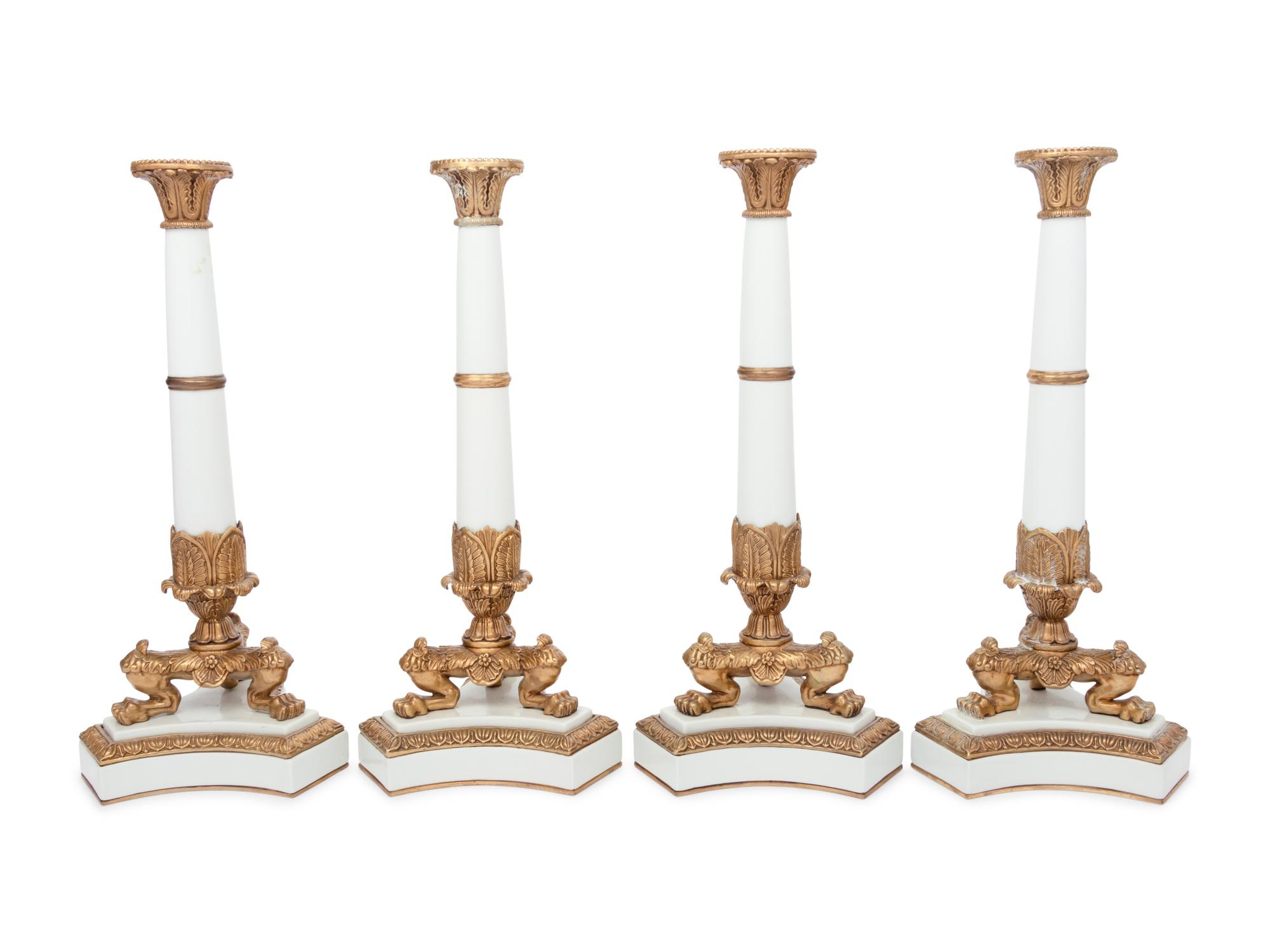 A Set of Four Contemporary Empire Style Gilt Metal Mounted Porcelain Candlesticks